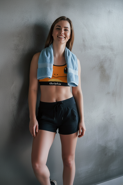 Fire inspired orange sports bra with custom name – flame spirit activewear for women