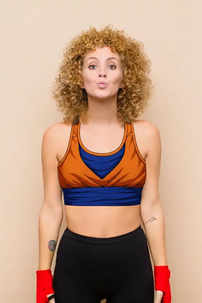 Warrior Spirit sports bra in Orange/Navy colorblock — anime‑inspired training gear front view