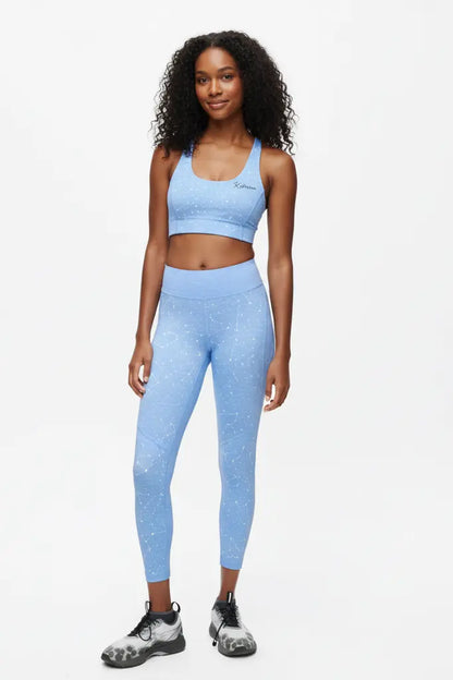 Woman wearing a blue OnlyBulked athletic outfit.