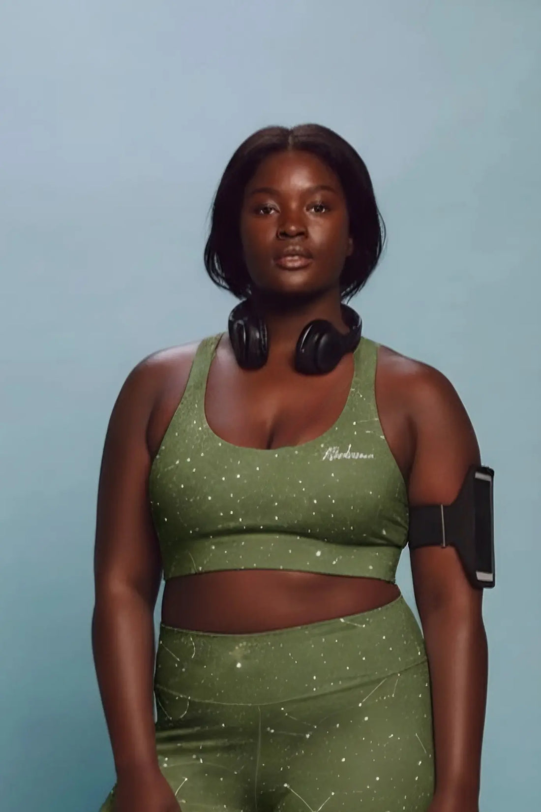 Woman wearing a OnlyBulked olive athletic outfit.