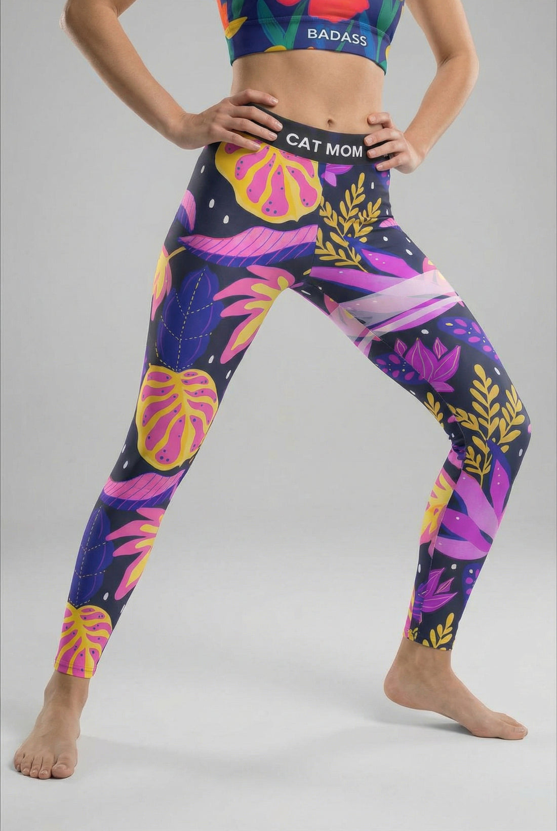  leggings with neon tropical leaf pattern and custom 'CAT MOM' text on waistband