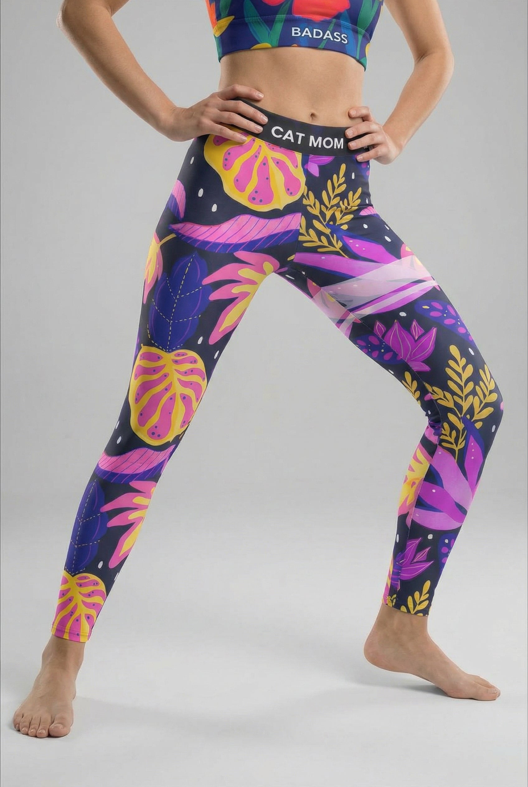  leggings with neon tropical leaf pattern and custom 'CAT MOM' text on waistband