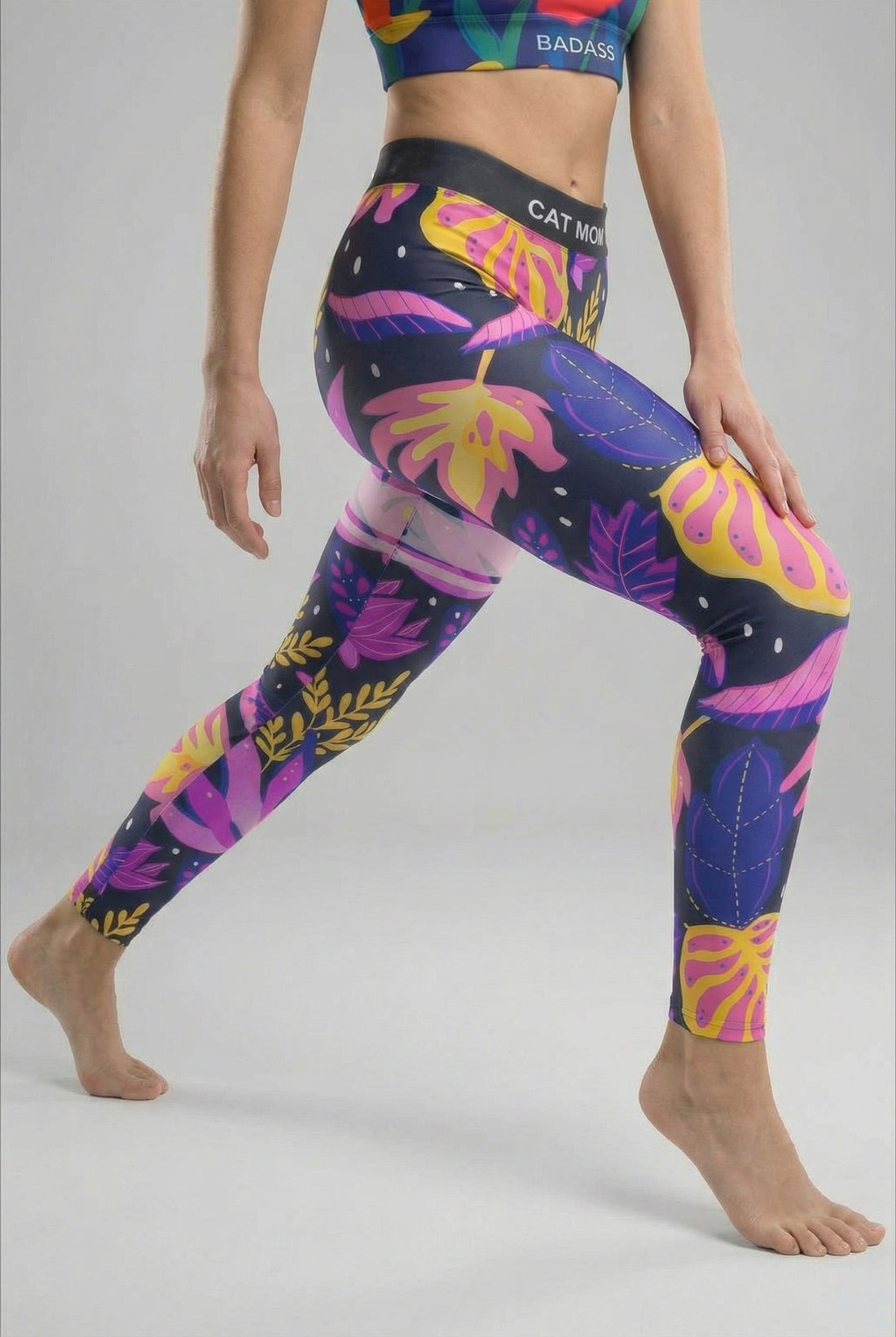  leggings with neon tropical leaf pattern and custom 'CAT MOM' text on waistband